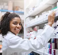 pharmacist checking inventory